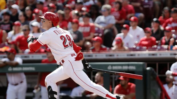 Sep 24, 2023; Cincinnati, Ohio, USA; Cincinnati Reds center fielder TJ Friedl (29) hits a two-run home run against the Pittsburgh Pirates during the sixth inning at Great American Ball Park. Mandatory Credit: David Kohl-USA TODAY Sports  